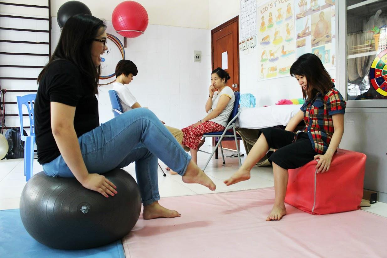 Interns help Agent Orange victims as part of their occupational therapy internship in Vietnam with Projects Abroad. Intern from Projects Abroad is seen performing exercises with a child as part of her occupational therapy internship in Vietnam.
